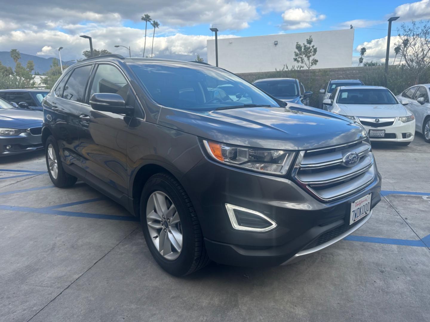 2016 Gray /Black Ford Edge SEL AWD (2FMPK4J93GB) with an 2.0L L4 DOHC 16V engine, 6A transmission, located at 30 S. Berkeley Avenue, Pasadena, CA, 91107, (626) 248-7567, 34.145447, -118.109398 - Low Miles! - Photo#6